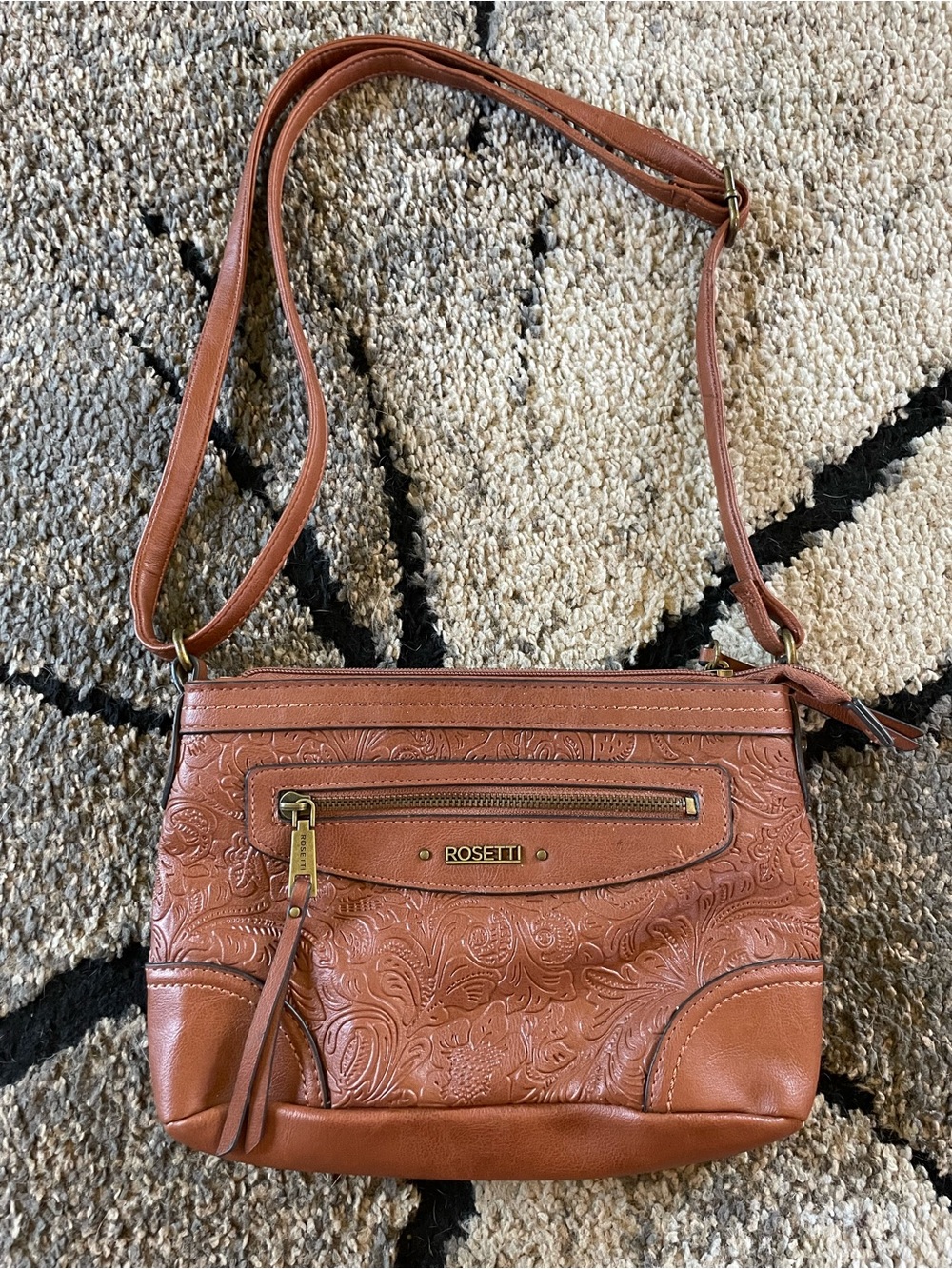 Rosetti embossed floral faux leather crossbody purse